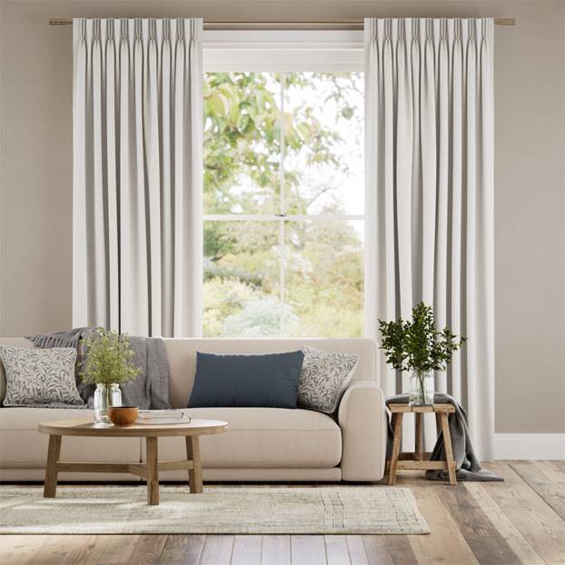 Pinch pleat curtains in a lounge